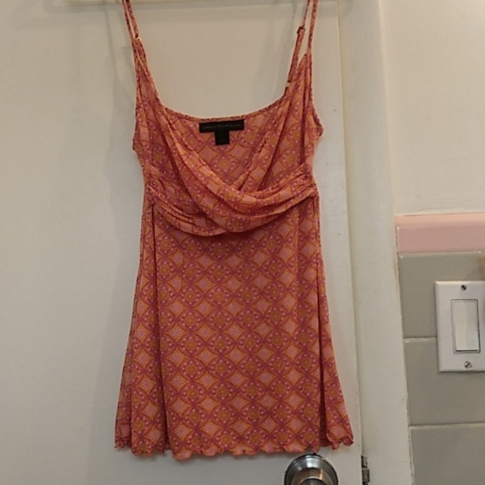 This cute tank top is a EXPRESS DESIGN STUDIO size Small.